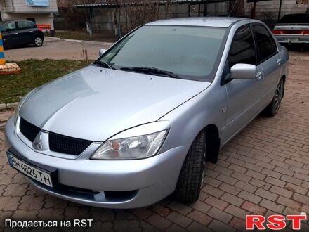 Сірий Міцубісі Lancer, об'ємом двигуна 1.6 л та пробігом 171 тис. км за 4550 $, фото 1 на Automoto.ua