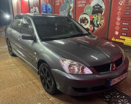 Серый Мицубиси Лансер, объемом двигателя 1.6 л и пробегом 268 тыс. км за 4600 $, фото 1 на Automoto.ua