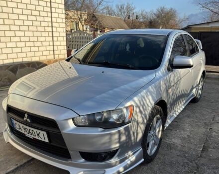 Серый Мицубиси Лансер, объемом двигателя 2 л и пробегом 246 тыс. км за 6500 $, фото 1 на Automoto.ua