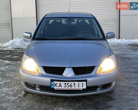 Серый Мицубиси Лансер, объемом двигателя 1.59 л и пробегом 313 тыс. км за 4000 $, фото 1 на Automoto.ua