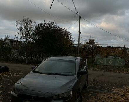 Сірий Міцубісі Lancer, об'ємом двигуна 2 л та пробігом 250 тис. км за 5555 $, фото 1 на Automoto.ua