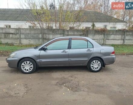Сірий Міцубісі Lancer, об'ємом двигуна 1.58 л та пробігом 1 тис. км за 2850 $, фото 1 на Automoto.ua