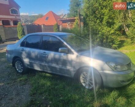 Сірий Міцубісі Lancer, об'ємом двигуна 1.6 л та пробігом 290 тис. км за 3850 $, фото 1 на Automoto.ua