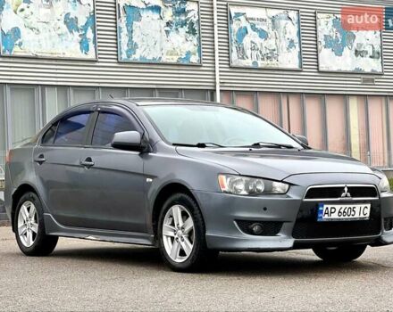 Серый Мицубиси Лансер, объемом двигателя 2 л и пробегом 203 тыс. км за 4999 $, фото 1 на Automoto.ua