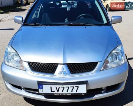 Серый Мицубиси Лансер, объемом двигателя 1.58 л и пробегом 158 тыс. км за 4900 $, фото 1 на Automoto.ua
