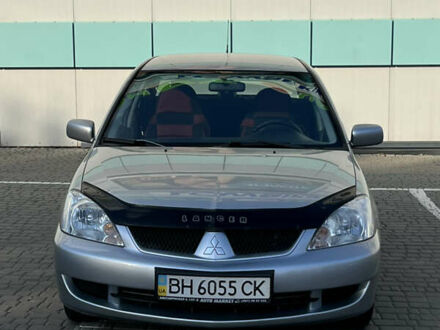 Сірий Міцубісі Lancer, об'ємом двигуна 1.58 л та пробігом 147 тис. км за 4999 $, фото 1 на Automoto.ua