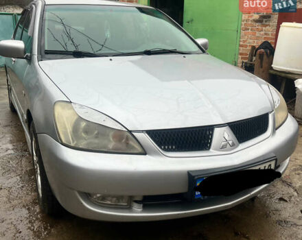 Серый Мицубиси Лансер, объемом двигателя 1.6 л и пробегом 282 тыс. км за 4699 $, фото 1 на Automoto.ua
