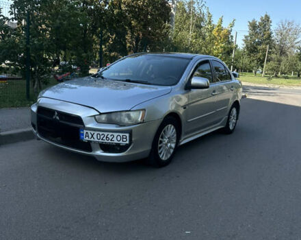 Серый Мицубиси Лансер, объемом двигателя 2 л и пробегом 200 тыс. км за 6000 $, фото 1 на Automoto.ua