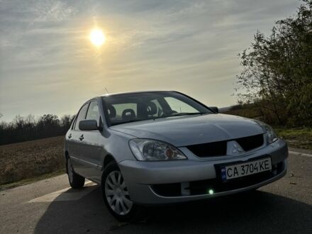 Серый Мицубиси Лансер, объемом двигателя 1.6 л и пробегом 228 тыс. км за 4500 $, фото 1 на Automoto.ua