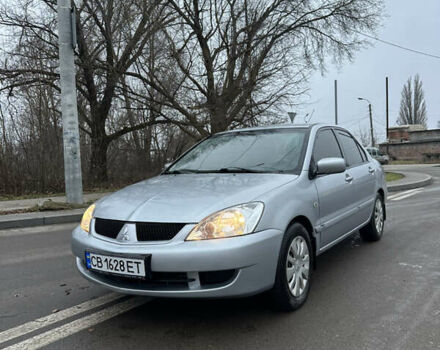 Сірий Міцубісі Lancer, об'ємом двигуна 1.58 л та пробігом 180 тис. км за 3900 $, фото 1 на Automoto.ua