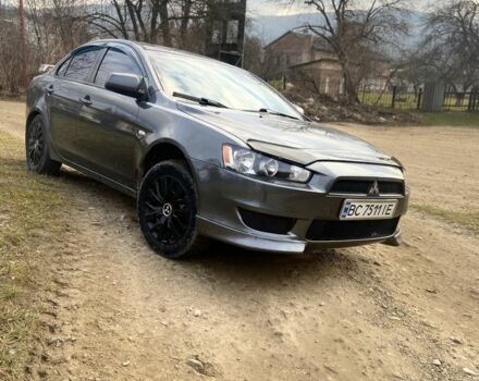 Сірий Міцубісі Lancer, об'ємом двигуна 2 л та пробігом 220 тис. км за 5750 $, фото 1 на Automoto.ua