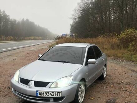 Серый Мицубиси Лансер, объемом двигателя 1.58 л и пробегом 268 тыс. км за 3450 $, фото 1 на Automoto.ua