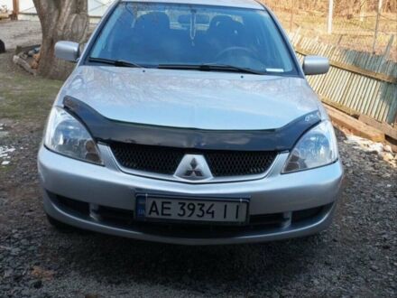 Сірий Міцубісі Lancer, об'ємом двигуна 1.6 л та пробігом 244 тис. км за 5250 $, фото 1 на Automoto.ua