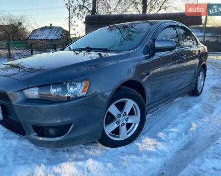 Серый Мицубиси Лансер, объемом двигателя 2 л и пробегом 188 тыс. км за 6200 $, фото 1 на Automoto.ua