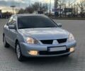 Сірий Міцубісі Lancer, об'ємом двигуна 0 л та пробігом 104 тис. км за 7700 $, фото 1 на Automoto.ua