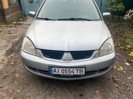 Мицубиси Лансер 2008 в Киеве на Automoto.ua Серый Мицубиси Лансер, объемом двигателя 1.6 л и пробегом 336 тыс. км за 3900 $, фото 1 на Automoto.ua