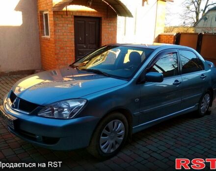 Серый Мицубиси Лансер, объемом двигателя 1.4 л и пробегом 200 тыс. км за 5700 $, фото 1 на Automoto.ua