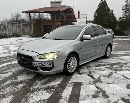 Сірий Міцубісі Lancer, об'ємом двигуна 2 л та пробігом 238 тис. км за 5800 $, фото 1 на Automoto.ua