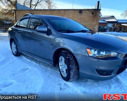 Серый Мицубиси Лансер, объемом двигателя 2 л и пробегом 18800 тыс. км за 6200 $, фото 1 на Automoto.ua