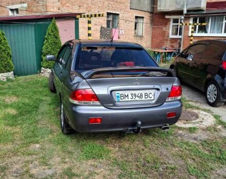 Сірий Міцубісі Lancer, об'ємом двигуна 1.6 л та пробігом 150 тис. км за 5100 $, фото 1 на Automoto.ua
