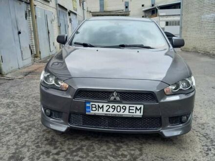 Серый Мицубиси Лансер, объемом двигателя 2 л и пробегом 99 тыс. км за 7800 $, фото 1 на Automoto.ua