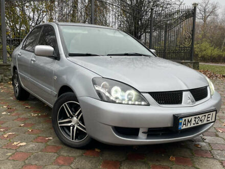 Серый Мицубиси Лансер, объемом двигателя 1.59 л и пробегом 219 тыс. км за 4500 $, фото 1 на Automoto.ua