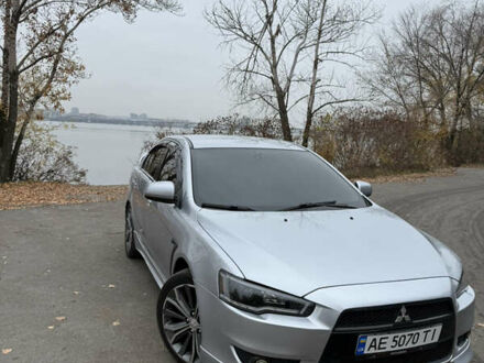 Серый Мицубиси Лансер, объемом двигателя 2 л и пробегом 253 тыс. км за 8700 $, фото 1 на Automoto.ua