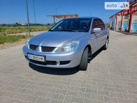 Міцубісі Lancer 2008 у Тячеве на Automoto.ua Сірий Міцубісі Lancer, об'ємом двигуна 1.6 л та пробігом 128 тис. км за 6000 $, фото 1 на Automoto.ua