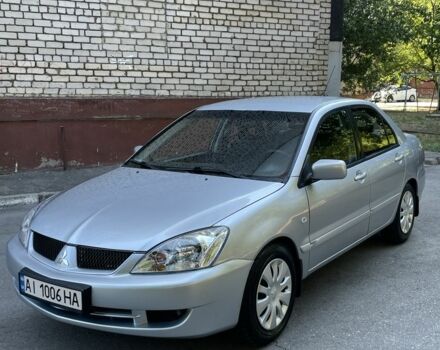 Сірий Міцубісі Lancer, об'ємом двигуна 1.6 л та пробігом 210 тис. км за 4600 $, фото 1 на Automoto.ua