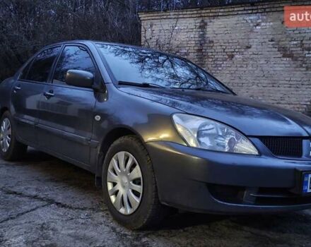 Сірий Міцубісі Lancer, об'ємом двигуна 1.6 л та пробігом 230 тис. км за 4400 $, фото 1 на Automoto.ua