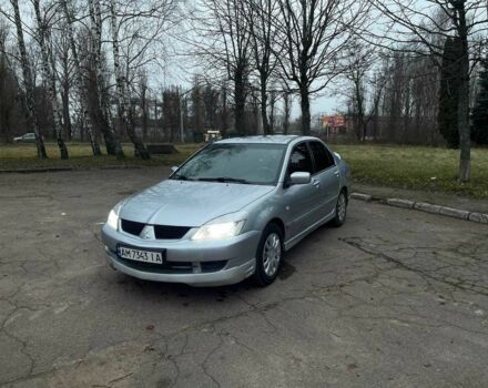 Сірий Міцубісі Lancer, об'ємом двигуна 1.6 л та пробігом 254 тис. км за 3800 $, фото 1 на Automoto.ua