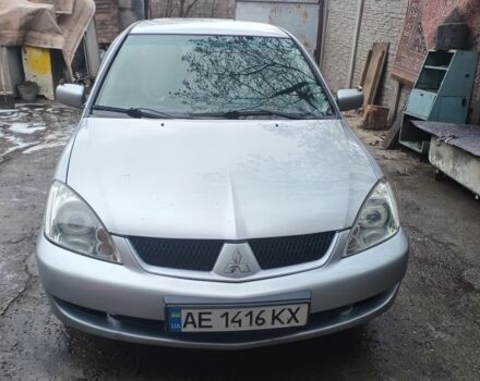 Серый Мицубиси Лансер, объемом двигателя 1.6 л и пробегом 320 тыс. км за 4167 $, фото 1 на Automoto.ua