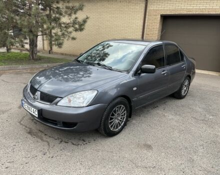 Серый Мицубиси Лансер, объемом двигателя 1.6 л и пробегом 225 тыс. км за 3800 $, фото 1 на Automoto.ua