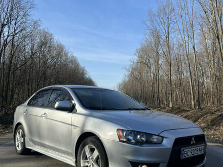 Сірий Міцубісі Lancer, об'ємом двигуна 2 л та пробігом 227 тис. км за 7499 $, фото 1 на Automoto.ua