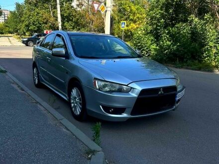 Серый Мицубиси Лансер, объемом двигателя 2 л и пробегом 240 тыс. км за 6500 $, фото 1 на Automoto.ua