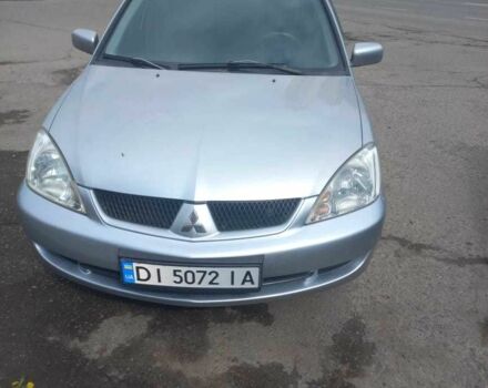 Сірий Міцубісі Lancer, об'ємом двигуна 1.6 л та пробігом 204 тис. км за 6000 $, фото 1 на Automoto.ua