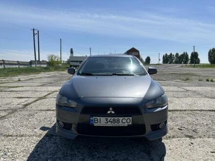 Сірий Міцубісі Lancer, об'ємом двигуна 2 л та пробігом 235 тис. км за 7300 $, фото 1 на Automoto.ua