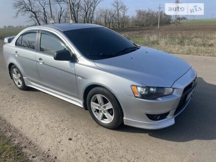 Сірий Міцубісі Lancer, об'ємом двигуна 2 л та пробігом 179 тис. км за 6399 $, фото 1 на Automoto.ua