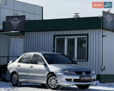 Серый Мицубиси Лансер, объемом двигателя 1.6 л и пробегом 258 тыс. км за 3790 $, фото 1 на Automoto.ua