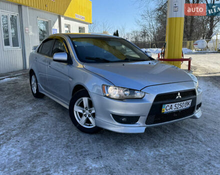 Серый Мицубиси Лансер, объемом двигателя 2 л и пробегом 235 тыс. км за 5999 $, фото 1 на Automoto.ua