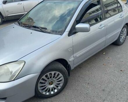 Сірий Міцубісі Lancer, об'ємом двигуна 1.58 л та пробігом 204 тис. км за 3600 $, фото 1 на Automoto.ua