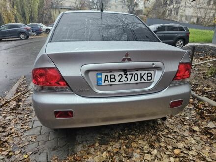 Сірий Міцубісі Lancer, об'ємом двигуна 1.6 л та пробігом 290 тис. км за 4800 $, фото 1 на Automoto.ua