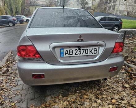 Серый Мицубиси Лансер, объемом двигателя 1.6 л и пробегом 290 тыс. км за 4800 $, фото 1 на Automoto.ua