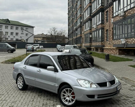 Сірий Міцубісі Lancer, об'ємом двигуна 1.6 л та пробігом 269 тис. км за 3999 $, фото 1 на Automoto.ua