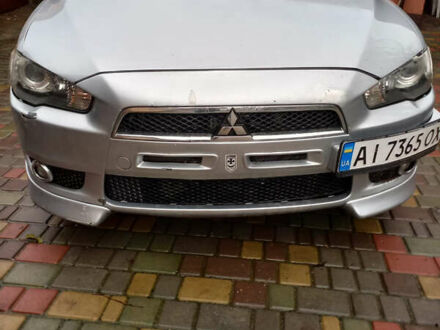 Серый Мицубиси Лансер, объемом двигателя 2 л и пробегом 180 тыс. км за 6400 $, фото 1 на Automoto.ua