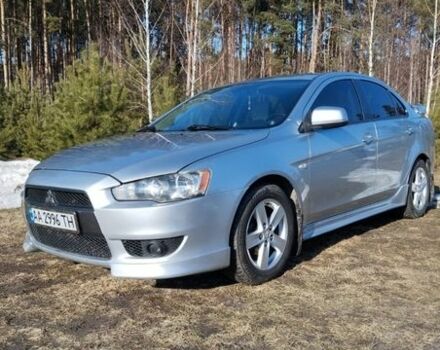 Серый Мицубиси Лансер, объемом двигателя 2 л и пробегом 312 тыс. км за 7000 $, фото 1 на Automoto.ua