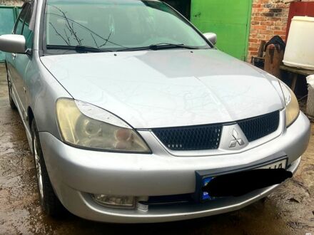 Сірий Міцубісі Lancer, об'ємом двигуна 1.6 л та пробігом 282 тис. км за 4699 $, фото 1 на Automoto.ua