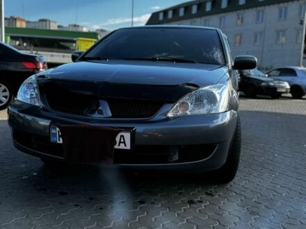 Сірий Міцубісі Lancer, об'ємом двигуна 1.6 л та пробігом 162 тис. км за 4200 $, фото 1 на Automoto.ua