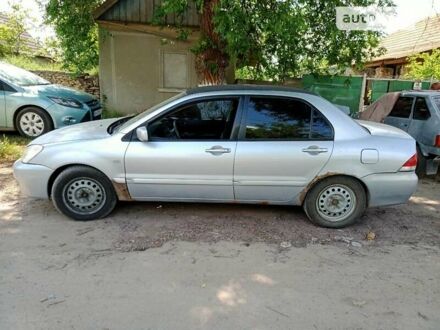 Міцубісі Lancer 2008 у Києві на Automoto.ua Сірий Міцубісі Lancer, об'ємом двигуна 0 л та пробігом 255 тис. км за 6100 $, фото 1 на Automoto.ua