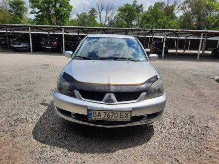 Сірий Міцубісі Lancer, об'ємом двигуна 1.6 л та пробігом 370 тис. км за 2950 $, фото 1 на Automoto.ua